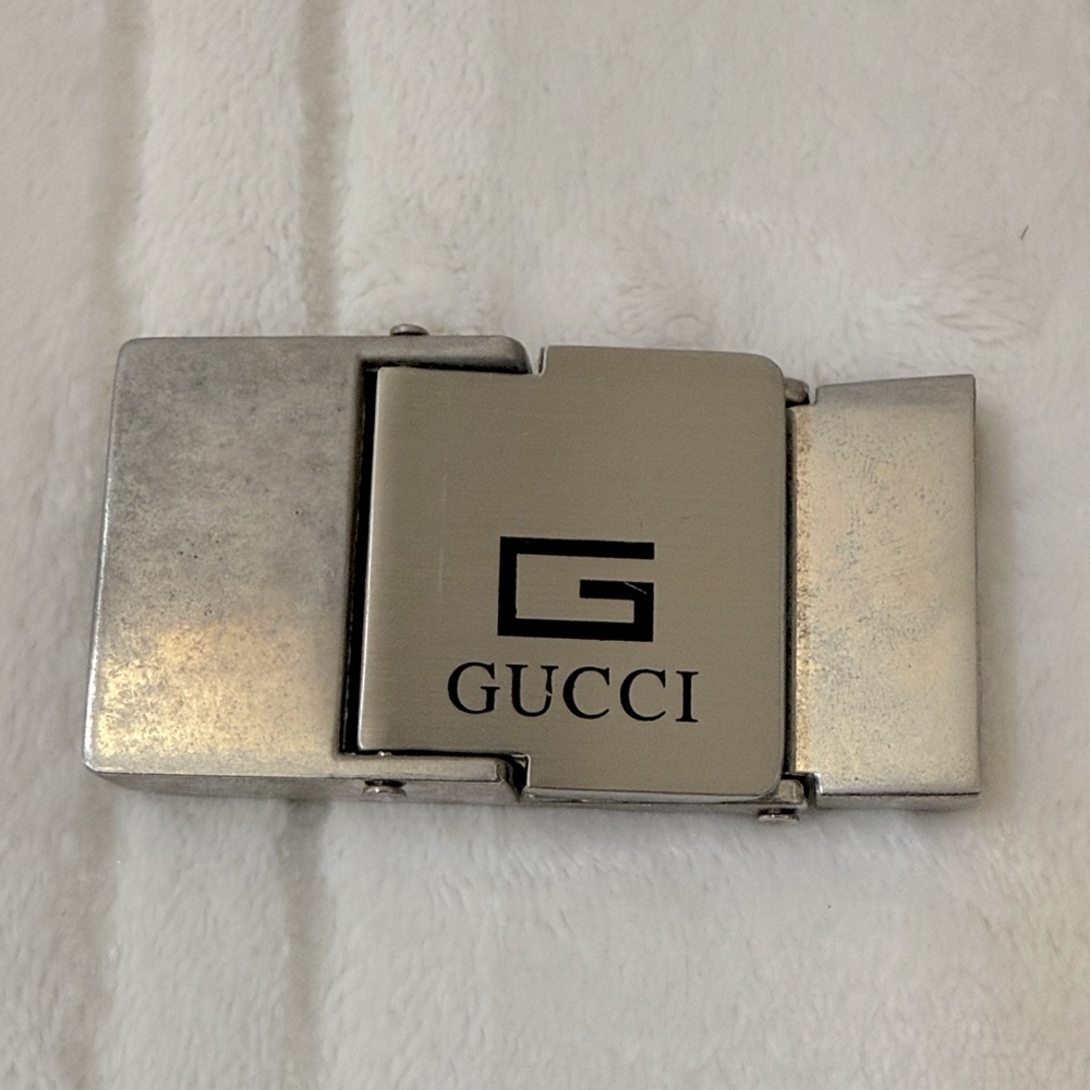 Vintage Gucci Silver Belt Buckle with the iconic "G" logo and "GUCCI" engraving